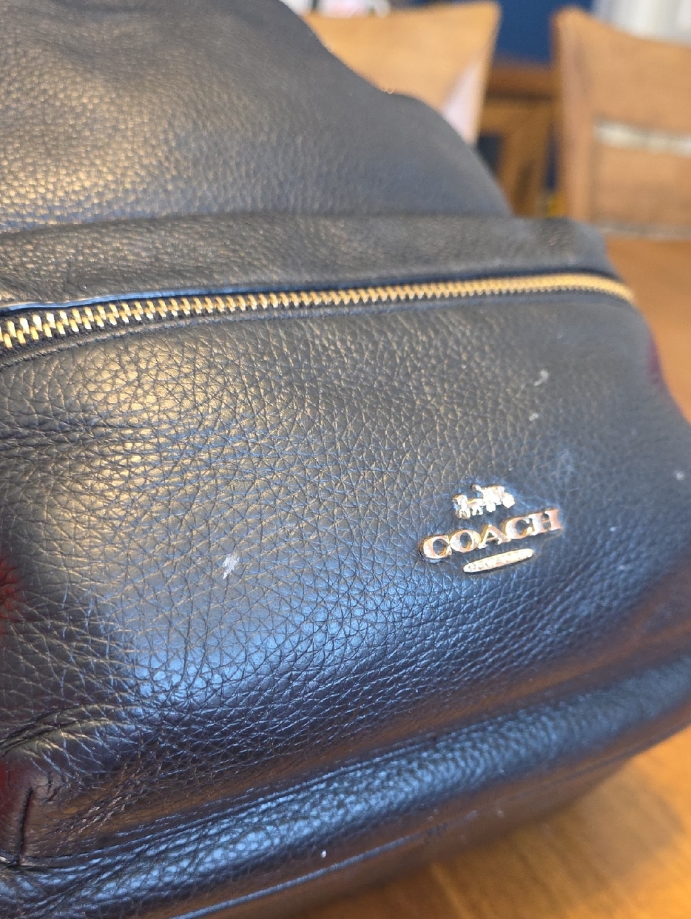 Coach Medium Charlie Backpack in black pebbled leather. - Picture 10 of 16